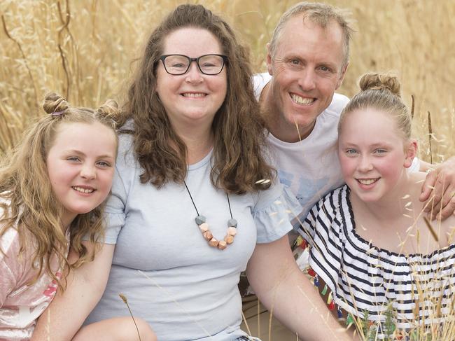 Kylie (44) and Neil May (47) with their daughters Allira (11) and Talleah (9) packed up, sold their eastern suburbs home and moved to the country upon advice from The Barefoot Investor. The family are now debt free and the kids spend more time outdoors. Picture:Rob Leeson.