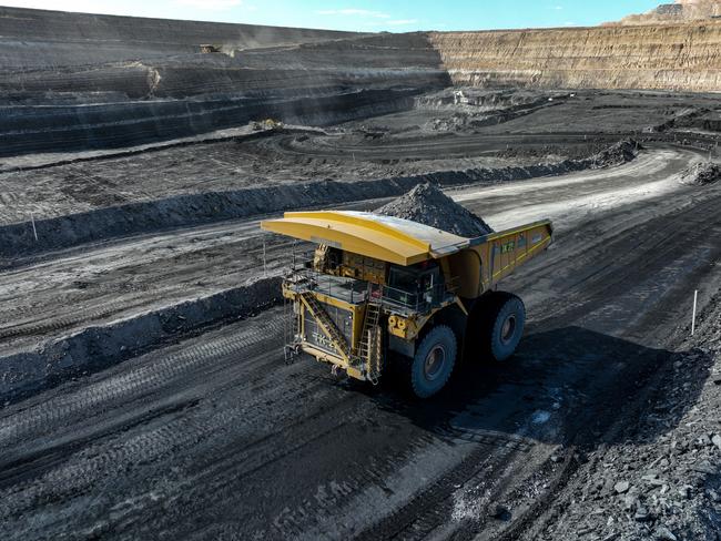 12 April 2022. Coal mining operations from Bravus (formerly known as Adani) at their Carmichael Coal Mine, Qld.A haul truck moving interburden to expose the next coal seam at the Carmichael minePIC: Cameron Laird