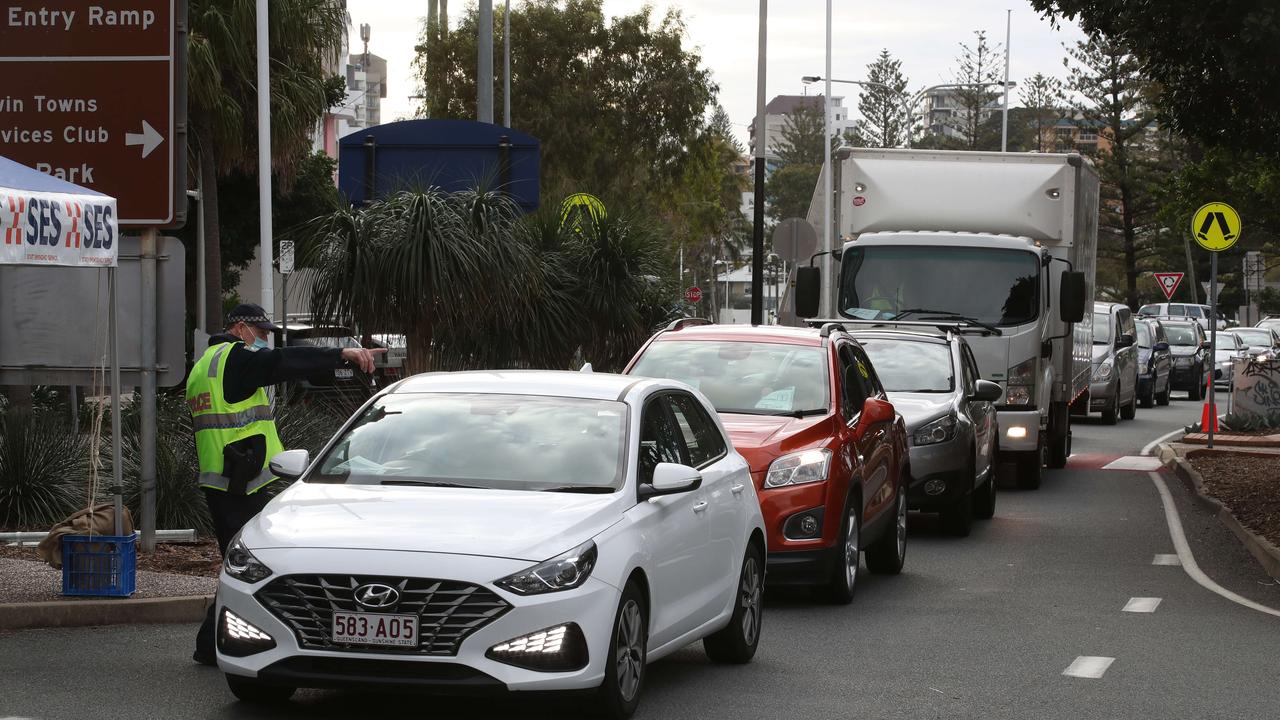 The hard border and long Queues return to the Qld NSW border on the Gold Coast. People getting the thumbs up or turned away in Griffith St Coolangatta. Picture: Glenn Hampson.