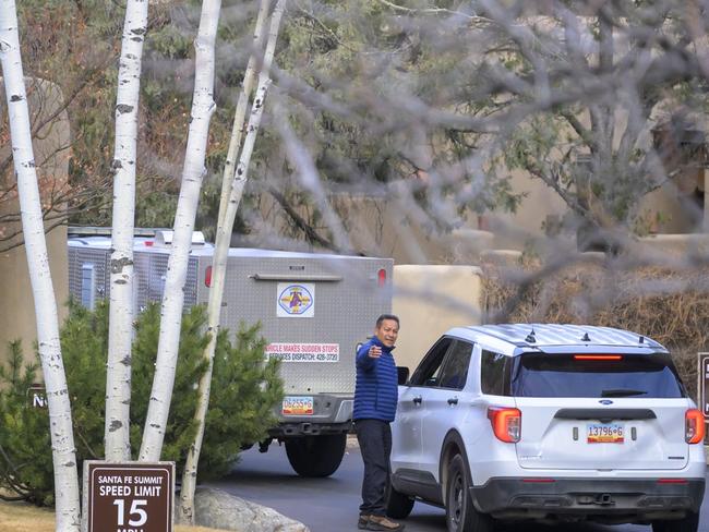 Santa Fe County Sheriff deputies arrive at the gated community where actor Gene Hackman and his wife Betsy Arakawa lived. Picture: AP