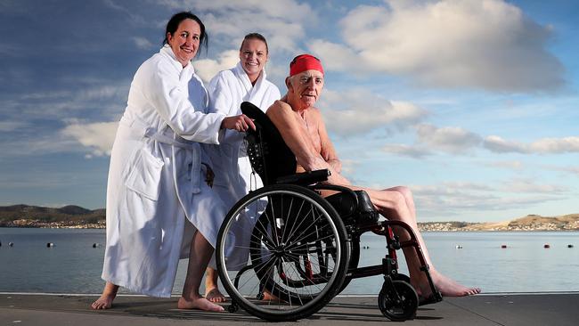 Graeme Mineall, 74, of Launceston, with Masonic Care Tasmania support staff Angie Cassidy, left, and Sarah Franks are ready for Friday morning’s nude swim. Picture: SAM ROSEWARNE