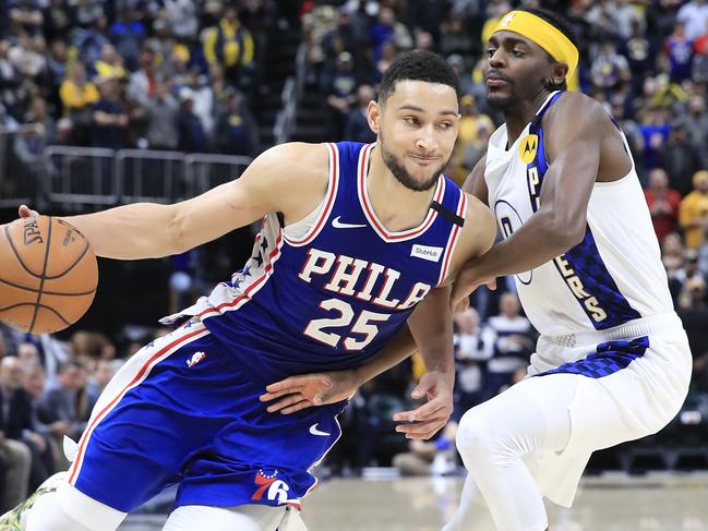 (FILES) In this file photo taken on January 12, 2020  Ben Simmons #25 of the Philadelphia 76ers dribbles the ball against the Indiana Pacers at Bankers Life Fieldhouse in Indianapolis, Indiana. - Philadelphia's All-Star guard Ben Simmons says he's at full strength heading into the NBA restart, having used the coronavirus shutdown to recover from injury. (Photo by ANDY LYONS / GETTY IMAGES NORTH AMERICA / AFP)