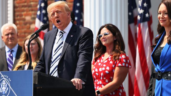 Mr Trump announcing the class action lawsuits. Picture: Michael M. Santiago/Getty Images/AFP