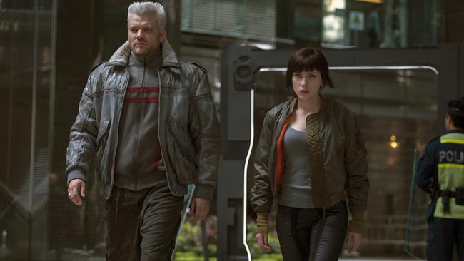 Pilou Asbaek, left, and Scarlett Johansson appear in Ghost in the Shell.