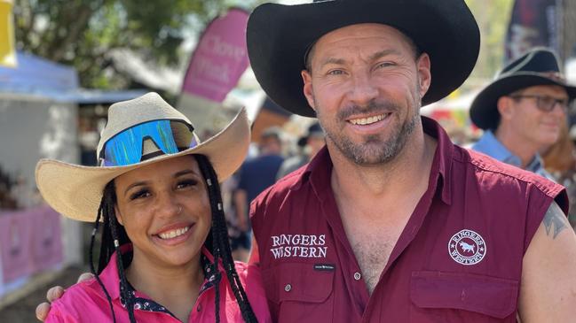 Jess Dawson and Chris Vanstone, from the Gold Coast, enjoy day one of the 2024 Gympie Muster, at the Amamoor State Forest on August 22, 2024.