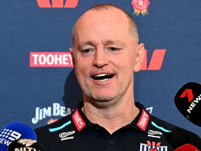 BRISBANE, AUSTRALIA - JULY 16: Coach Michael Maguire speaks during a NSW Blues State of Origin media opportunity at Sofitel Brisbane Central on July 16, 2024 in Brisbane, Australia. (Photo by Bradley Kanaris/Getty Images)