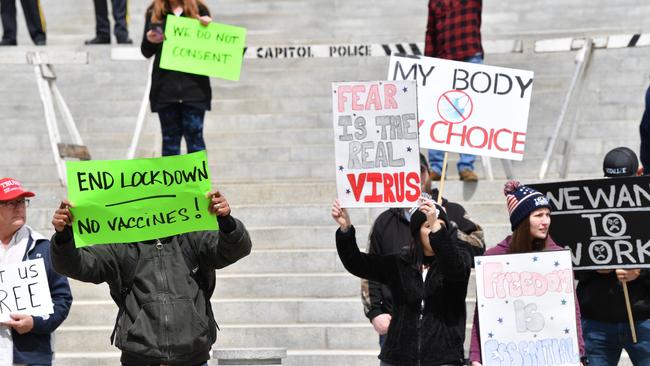 Protesters hold up signs in Pennsylvania. Picture: AFP