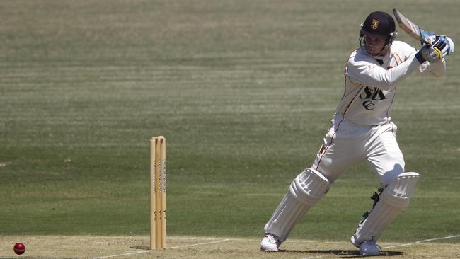 Peter Handscomb smashes a ball for St Kilda in the Premier cricket. Picture: Richard Serong