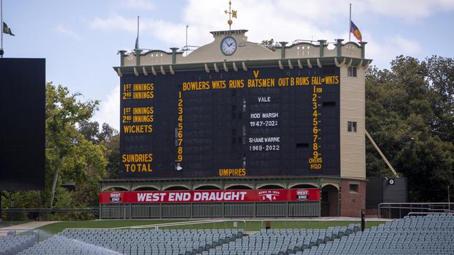 Adelaide Oval’s scoreboard recognises the deaths of Rod Marsh and Shane Warne. Picture: Emma Brasier