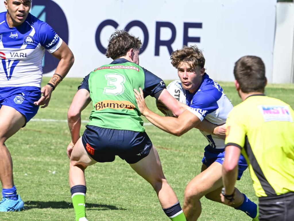 Jai Callaghan tries to get past James Croker. Picture: Martin Ollman