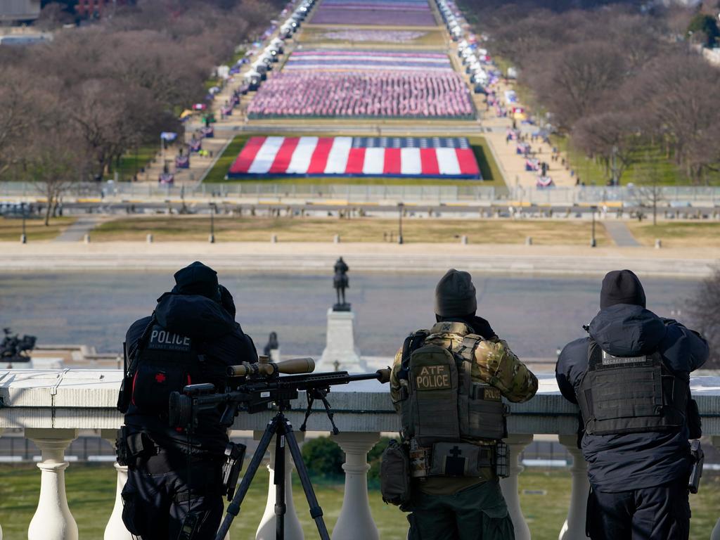 Law enforcement personnel monitor the Capitol in Washington, DC, amid security concerns surrounding the inauguration. Picture: AFP