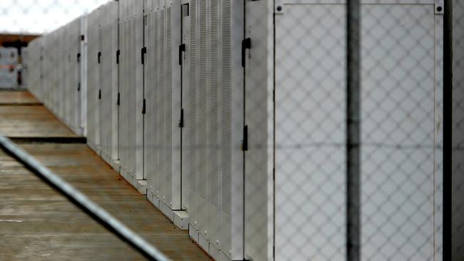 Tesla lithium-ion batteries at the Hornsdale wind farm near Jamestown in South Australia. Picture: Bernard Humphreys