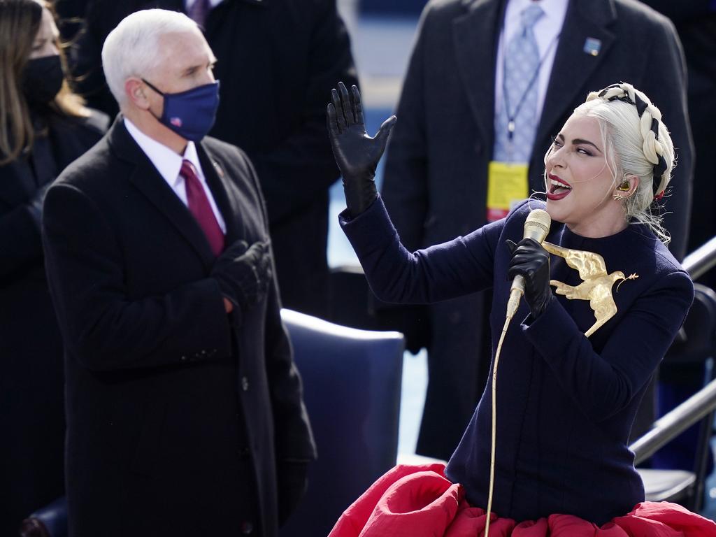 Lady Gaga sings the National Anthem, as Vice President Mike Pence looks on. Picture: Getty Images