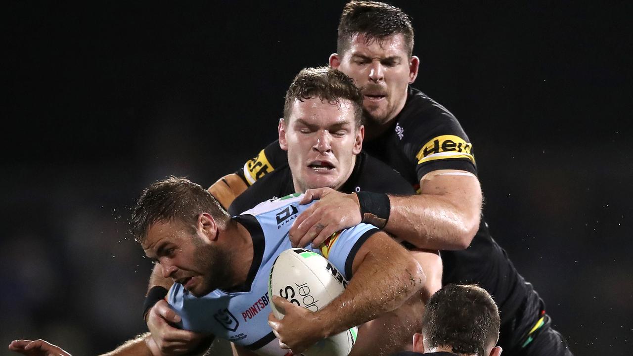 SYDNEY, AUSTRALIA – MAY 07: Wade Graham of the Sharks is tackled during the round nine NRL match between the Penrith Panthers and the Cronulla Sharks at BlueBet Stadium on May 07, 2021, in Sydney, Australia. (Photo by Matt King/Getty Images)