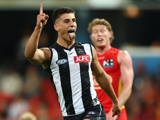 GOLD COAST, AUSTRALIA - JUNE 29: Nick Daicos of the Magpies celebrates a goal during the round 16 AFL match between Gold Coast Suns and Collingwood Magpies at People First Stadium, on June 29, 2024, in Gold Coast, Australia. (Photo by Chris Hyde/Getty Images)