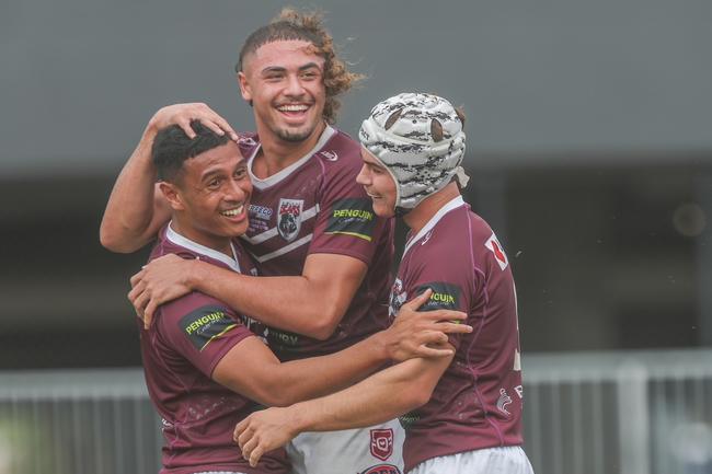 Tupou Francis (middle) and Burleigh Connell Cup teammates celebrate. Photo by Stephen Archer