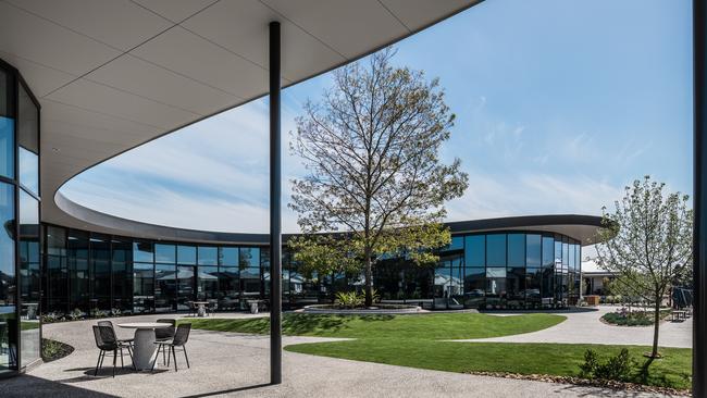 Outdoor seating and a barbecue area.