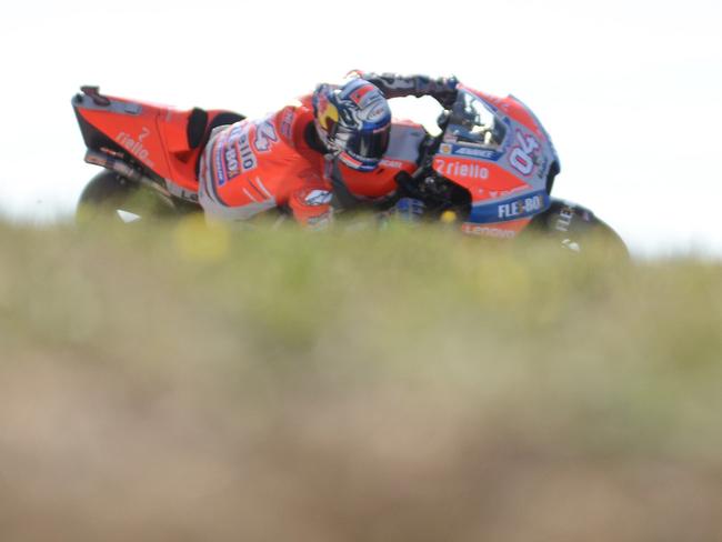 Ducati MotoGP Team's Italian rider Andrea Dovizioso rides his Ducati during a free practice session of the Moto GP Grand Prix of the Czech Republic in Brno on August 3, 2018. / AFP PHOTO / Michal CIZEK