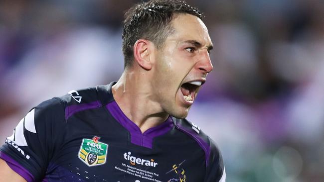 Billy Slater celebrates a try in the grand final.