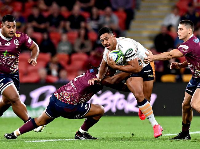 BRISBANE, AUSTRALIA - SEPTEMBER 05: Irae Simone of the Brumbies takes on the defence during the round 10 Super Rugby AU match between the Reds and the Brumbies at Suncorp Stadium on September 05, 2020 in Brisbane, Australia. (Photo by Bradley Kanaris/Getty Images)