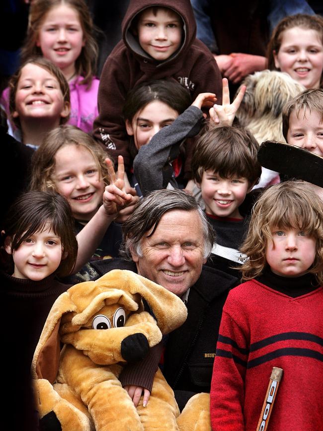 Teacher and author John Marsden with pupils at his Candlebark School in Romsey.