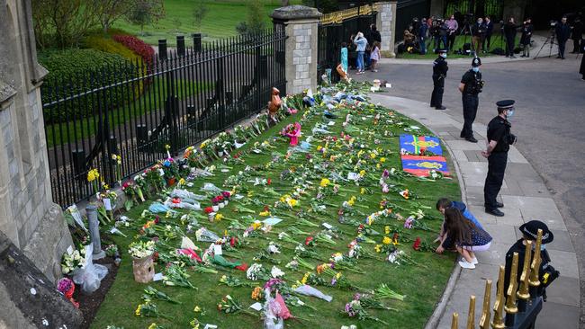 Floral tributes outside Windsor Castle, where a pared-back funeral for Prince Philip is expected to be held in the coming days. Picture: Getty