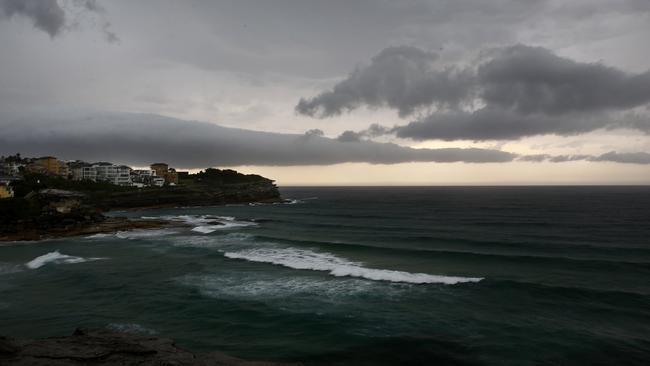 Dark clouds over Tamarama as Thunder storms hit Sydney. Picture: John Appleyard