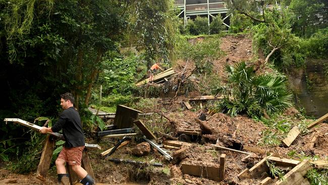 Dave Parker begins the task of removing rubble from a landslide on his North Narrabeen property on Wednesday. Picture: NCA NewsWire / Jeremy Piper