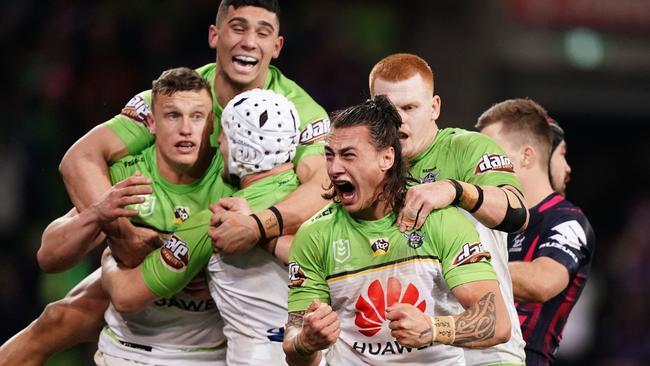 The Raiders celebrate after their astonishing comeback. Photo: AAP Image/Scott Barbour