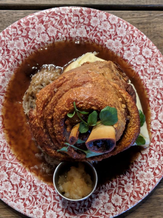 The Bavarian's famous crispy pork knuckle served with mash, sauerkraut, bier jus and apple compote ($28 half/$35 full size).