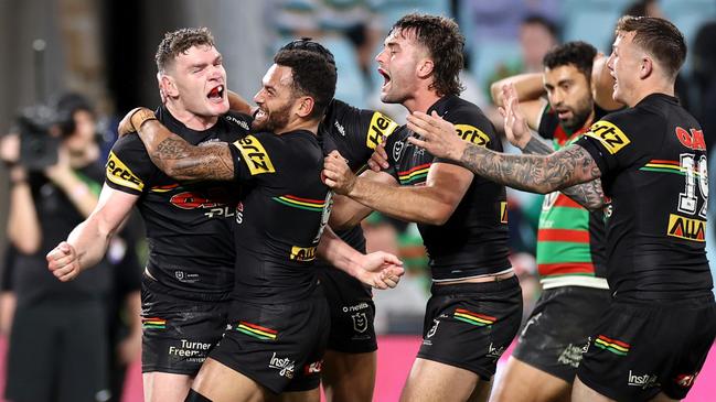 Liam Martin, left, scored the matchwinning try for the Panthers. Picture: Cameron Spencer/Getty Images