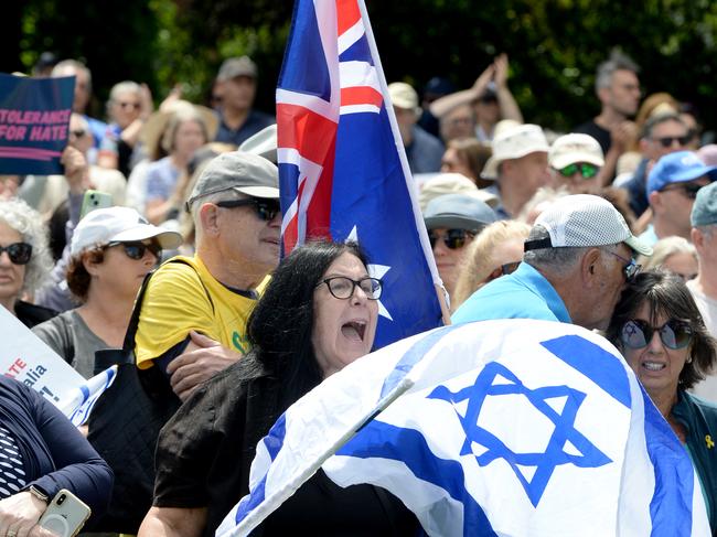 MELBOURNE, AUSTRALIA - NewsWire Photos DECEMBER 08, 2024: People gather for a vigil near the Adass Israel Synagogue of Melbourne after it was destroyed by fire on Friday. Picture: NewsWire / Andrew Henshaw