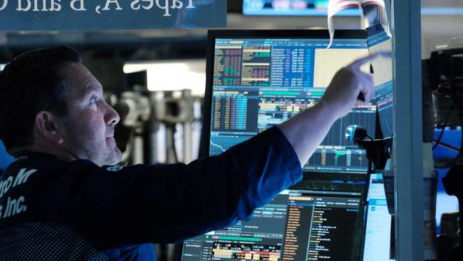 Traders work on the floor of the New York Stock Exchange on Thursday. Picture: Spencer Platt/Getty Images/AFP