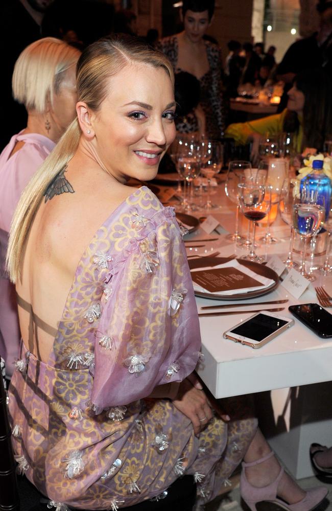 ‘Damn proud’ ... Kaley Cuoco, at a pre-COVID dinner, reckons The Flight Attendant is worth toasting.