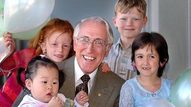  11/04/2005 Professor Graeme Clark with cochlear implant recipients, Jasmine Wong, 2, Samantha Williver, 7, Samuel McLarty, 6, and Brittany De Maria, 7. Bionic Ear Institute 20th anniversary of the 1st Cochlear Implant. 