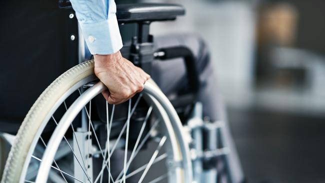 Dozens of Queenslanders with disabilities are languishing in public hospitals because of long delays in accessing finalised plans under the National Disability Insurance Scheme.