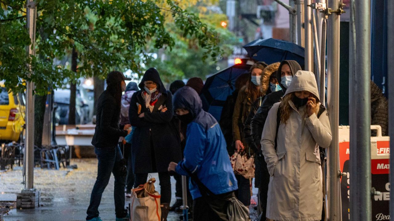 People stand in line in New York for COVID-19 testing on October 29. Infections have now eclipsed the nine million threshold. Picture: David Dee Delgado/Getty Images/AFP.