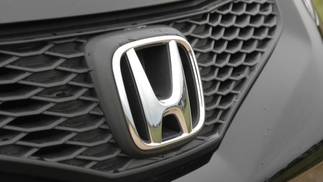 Honda Jazz. Motor car. Vehicle. Badge.