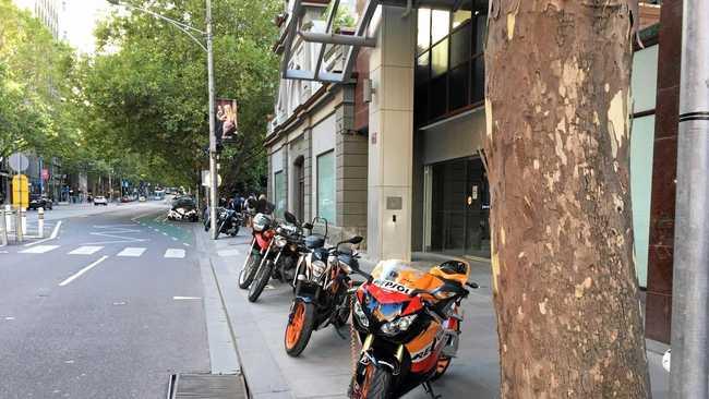 Footpath motorcycle parking already exists in city areas. Picture: Contributed