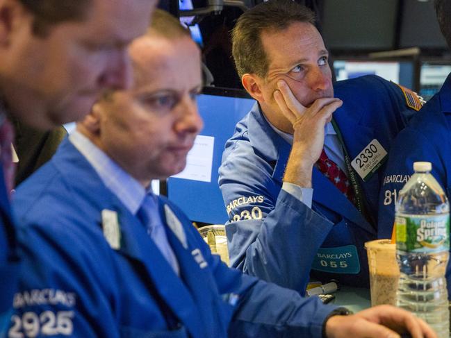 Traders work on the floor of the New York Stock Exchange shortly after the opening bell in New York, October 28, 2015. REUTERS/Lucas Jackson