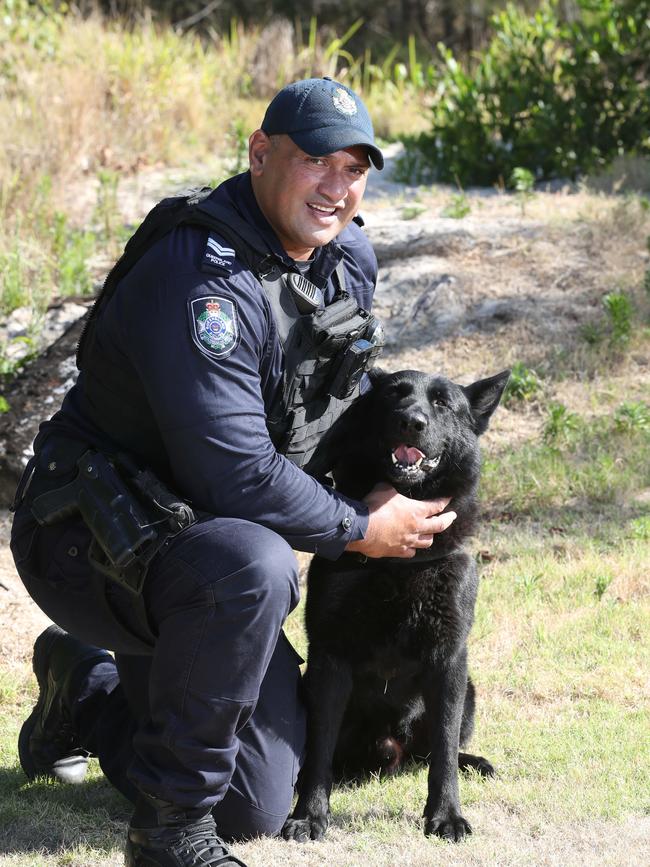 Senior Constable Joseph Alofipo with his dog Bravo who is about to retire. Picture Glenn Hampson