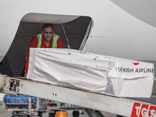 The coffin containing the body of former Ghana international football player Christian Atsu is loaded into an aeroplane bound for Ghana. Picture: AFP