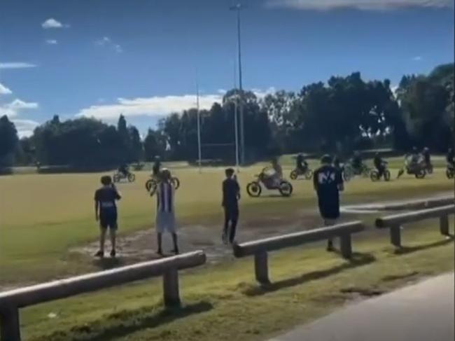 The group of riders met up at Pizzey Park before moving to the Bond Pirates Rugby Union Club where they proceeded to do burnouts and wheelies. Picture: 7 News