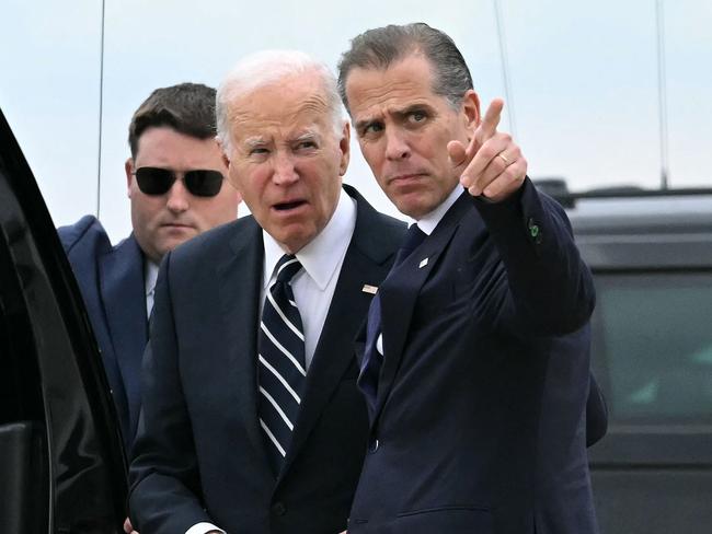 US President Joe Biden talks with his son Hunter Biden upon arrival at Delaware Air National Guard Base in New Castle, Delaware. Picture: AFP