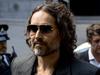 Russell Brand enters plea in rape trial