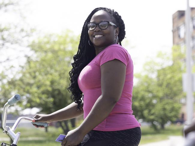 EMBARGO SATURDAY JUNE 5: NO THE AUSTRALIAN/NO THE WEST AUSTRALIAN/NO NEWS.COM/NO SKY NEWS:  ,  Brenda Garland, 47 enjoys visiting DetroitÃ¢â¬â¢s River Front district where bike paths and a new man made beach are revitalizing Detroit, Michigan, USA. Tuesday, May 18th, 2021 (Photo by Angus Mordant for NewsCorp Australia)