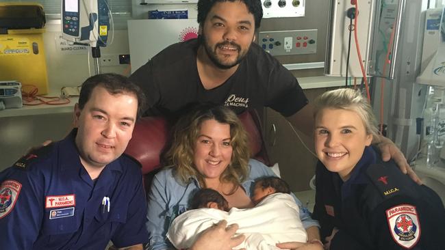 Parents Courtney and Jake Jauhari with their twin boys, Colbhi and Wilbur, and the MICA paramedics Peter Petherbridge and Sarah Phillips. Picture: Supplied