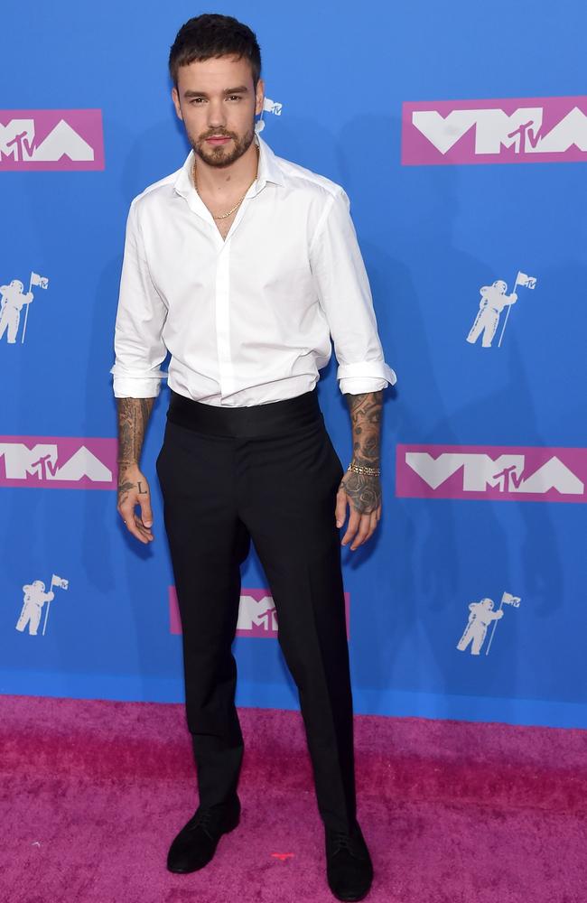 What are you doing on the red carpet, Liam? Table 39 wants a sav blanc and a sticky toffee pudding. Picture: Getty Images/AFP