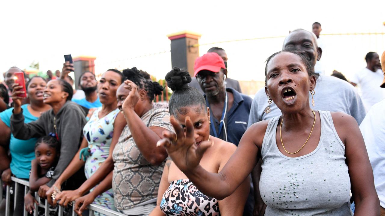 People protest the visit of the Duke and Duchess of Cambridge in Kingston, Jamaica. Picture: Ricardo Makyn/AFP