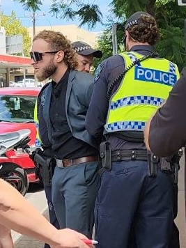 He was waiting at the Adelaide Watch House where a group of men who were arrested following a rally on Sunday would exit if granted bail. Picture: The Advertiser